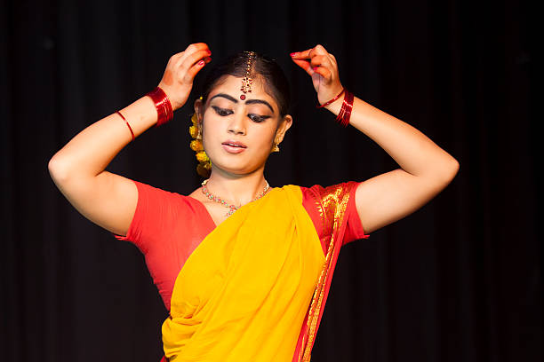 indian female classical dancer in the style bharatanatyam
